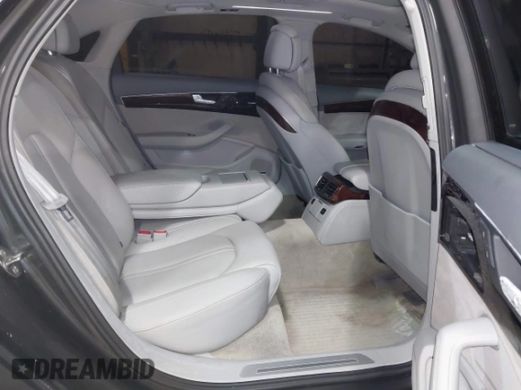 2012 Audi A8 z VIN WAURVAFD6CN014546, wystawiony jako IAAI lot #41357932 z przebiegiem 93 516 mil mil oraz . Historia ofert i sprzedaży dostępna na DreamBid. Obrazek 8.