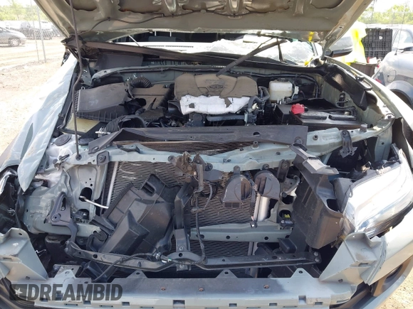 2023 Toyota Tacoma SR with VIN 3TMCZ5AN1PM581266, listed as a IAAI auction lot 42371395 with 32,582 mi miles and . Bid and sale history available at DreamBid. Image 10.