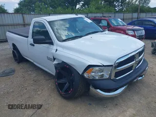 2014 Ram 1500 Tradesman with VIN 3C6JR6DT4EG186606, listed as a IAAI auction lot 42640415 with 113,110 mi miles and . Bid and sale history available at DreamBid. Image 1.