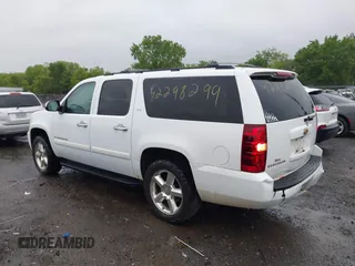 2008 Chevrolet Suburban LTZ z VIN 3GNFK16338G185462, wystawiony jako IAAI lot #42298299 z przebiegiem 301 758 mil mil oraz . Historia ofert i sprzedaży dostępna na DreamBid. Obrazek 14.