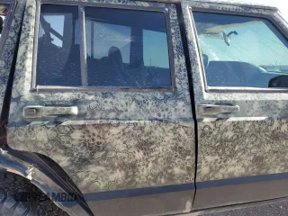 1999 Jeep Cherokee Sport with VIN 1J4FF68S6XL645028, listed as a Copart auction lot 48897255 with 218,552 mi miles and Salvage Title. Bid and sale history available at carsss.com. Image 11.