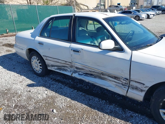 1999 Mercury Grand Marquis GS z VIN 2MEFM74W0XX686623, wystawiony jako IAAI lot #41828993 z przebiegiem 245 171 mil mil oraz . Historia ofert i sprzedaży dostępna na DreamBid. Obrazek 6.