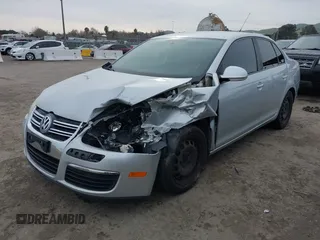 2010 Volkswagen Jetta Sedan S with VIN 3VWJZ7AJ1AM003298, listed as a IAAI auction lot 41583771 with 127,234 mi miles. Bid and sale history available at carsss.com. Image 2.