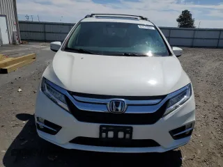 2018 Honda Odyssey Touring with VIN 5FNRL6H8XJB018438, listed as a Copart auction lot 61876505 with 104,581 mi miles and Salvage title. Bid and sale history available at DreamBid. Image 5.