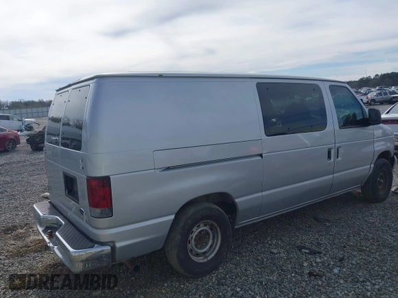 1998 Ford Econoline Cargo with VIN 1FTRE1428WHB30628, listed as a IAAI auction lot 41706164 with 153,223 mi miles. Bid and sale history available at carsss.com. Image 4.