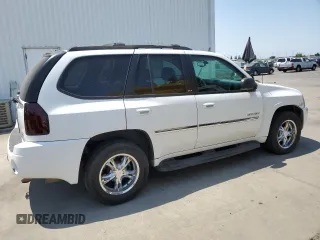 2006 GMC Envoy SLE z VIN 1GKDT13S762345183, wystawiony jako Copart lot #60096645 z przebiegiem 249 658 mil mil oraz Szkoda całkowita • Salvage title. Historia ofert i sprzedaży dostępna na DreamBid. Obrazek 3.