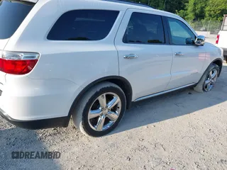 2013 Dodge Durango Citadel with VIN 1C4SDJET6DC652552, listed as a IAAI auction lot 42602746 with 163,602 mi miles and . Bid and sale history available at DreamBid. Image 4.