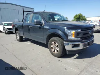 2018 Ford F-150 XL with VIN 1FTEX1EB2JKF61257, listed as a Copart auction lot 53674615 with 161,021 mi miles and Salvage title. Bid and sale history available at DreamBid. Image 4.