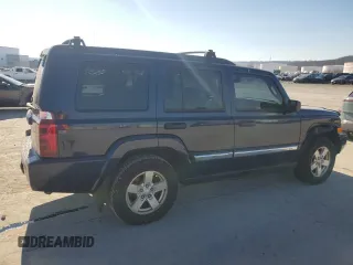 2006 Jeep Commander with VIN 1J8HH48K06C179567, listed as a Copart auction lot 88556105 with 196,696 mi miles and Salvage title. Bid and sale history available at DreamBid. Image 3.