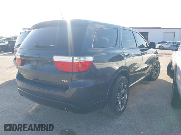 2013 Dodge Durango R/T with VIN 1C4SDHCT6DC658802, listed as a IAAI auction lot 42510985 with 67,653 mi miles and . Bid and sale history available at DreamBid. Image 4.