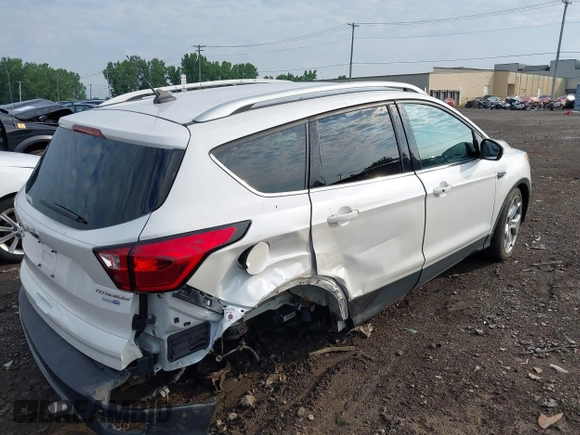 2019 Ford Escape Titanium with VIN 1FMCU9J97KUA03195, listed as a IAAI auction lot 42656589 with 40,099 mi miles and . Bid and sale history available at DreamBid. Image 4.