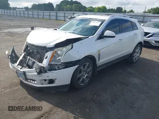 2012 Cadillac SRX Performance Collection with VIN 3GYFNBE34CS659748, listed as a IAAI auction lot 42693814 with 216,854 mi miles and . Bid and sale history available at DreamBid. Image 2.