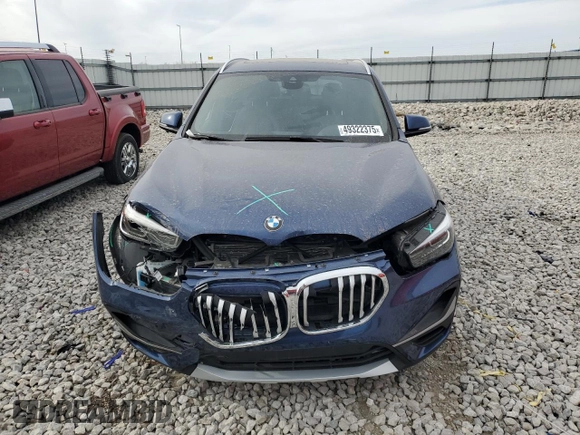 2021 BMW X1 xDrive28i z VIN WBXJG9C09M5T16797, wystawiony jako Copart lot #49322375 z przebiegiem 51 240 mil mil oraz Szkoda całkowita • Salvage title. Historia ofert i sprzedaży dostępna na DreamBid. Obrazek 5.