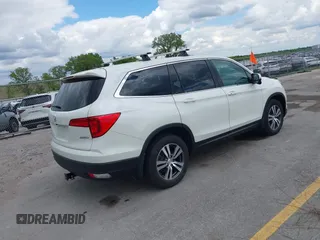 2017 Honda Pilot EX-L z VIN 5FNYF6H55HB098573, wystawiony jako IAAI lot #42347364 z przebiegiem 101 558 mil mil oraz . Historia ofert i sprzedaży dostępna na DreamBid. Obrazek 4.