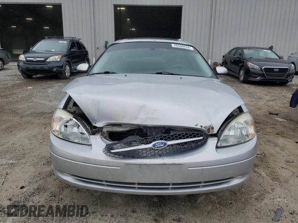 2003 Ford Taurus SEL Deluxe with VIN 1FAFP56S33G176389, listed as a Copart auction lot 70430654 with 222,085 mi miles and Salvage Title. Bid and sale history available at carsss.com. Image 5.