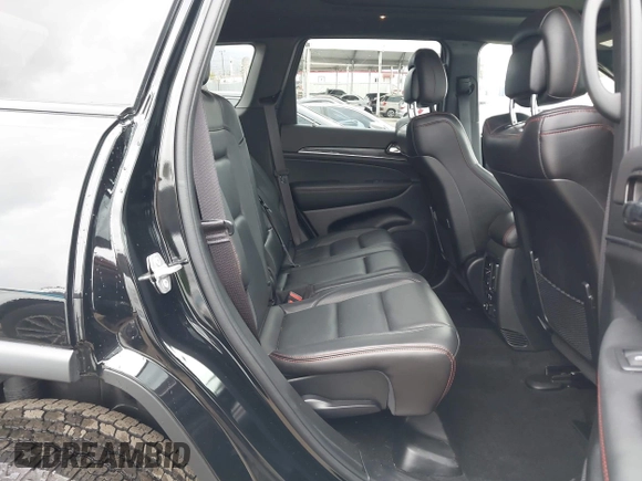 2021 Jeep Grand Cherokee Trailhawk with VIN 1C4RJFLT4MC771773, listed as a IAAI auction lot 42063954 with 17,920 mi miles and . Bid and sale history available at DreamBid. Image 8.