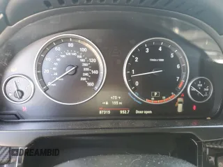 2015 BMW X5 xDrive35i z VIN 5UXKR0C52F0P12247, wystawiony jako Copart lot #54955465 z przebiegiem 87 315 mil mil oraz Szkoda całkowita • Salvage title. Historia ofert i sprzedaży dostępna na DreamBid. Obrazek 9.