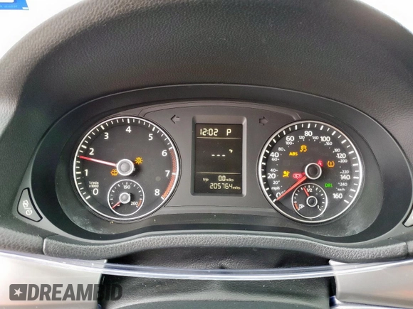 2014 Volkswagen Passat S with VIN 1VWAP7A34EC007652, listed as a Copart auction lot 57774695 with 205,764 mi miles and Salvage title. Bid and sale history available at DreamBid. Image 9.