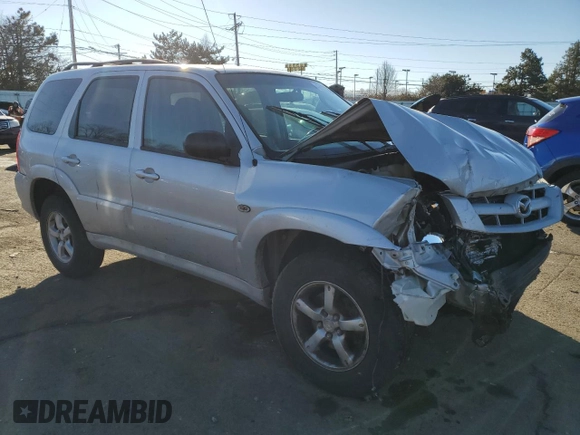 2006 Mazda Tribute S with VIN 4F2YZ04166KM17017, listed as a Copart auction lot 42969365 with 217,984 mi miles and Salvage Title. Bid and sale history available at DreamBid. Image 4.
