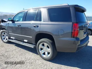 2017 Chevrolet Tahoe LT with VIN 1GNSCBKC1HR403647, listed as a IAAI auction lot 42237667 with 90,969 mi miles and . Bid and sale history available at DreamBid. Image 3.