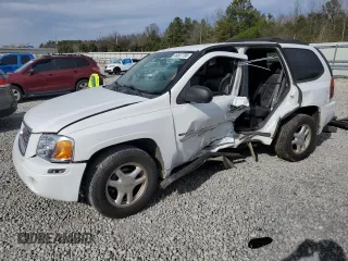 2006 GMC Envoy SLE with VIN 1GKDT13S762262093, listed as a Copart auction lot 49507795 with 0 mi miles and Salvage Title. Bid and sale history available at carsss.com. Image 1.