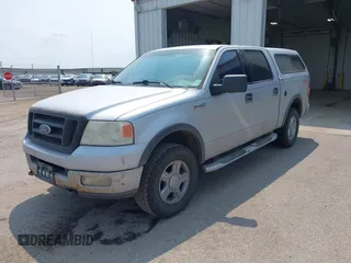 2004 Ford F-150 XLT with VIN 1FTPW14554KC67850, listed as a IAAI auction lot 42391663 with 231,493 mi miles and . Bid and sale history available at DreamBid. Image 2.