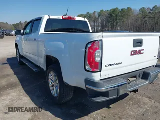 2015 GMC Canyon 2WD SLT with VIN 1GTG5CE36F1151433, listed as a IAAI auction lot 41636107 with 117,682 mi miles. Bid and sale history available at carsss.com. Image 3.
