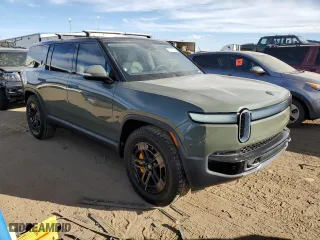 2023 Rivian R1S Launch Edition with VIN 7PDSGABL2PN008950, listed as a Copart auction lot 72091794 with 18,257 mi miles and Non Repairable. Bid and sale history available at carsss.com. Image 4.