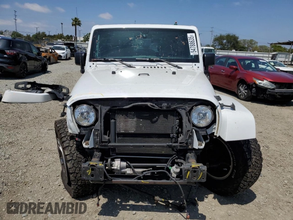 2015 Jeep Wrangler Unlimited Rubicon with VIN 1C4BJWFG6FL508493, listed as a Copart auction lot 54788635 with 127,694 mi miles and Salvage title. Bid and sale history available at DreamBid. Image 5.