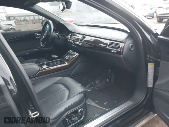 2015 Audi A8 L 4.0T with VIN WAU32AFD5FN026108, listed as a IAAI auction lot 41652860 with 148,253 mi miles. Bid and sale history available at carsss.com. Image 5.