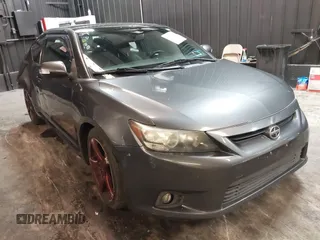 2012 Scion tC with VIN JTKJF5C7XC3034998, listed as a IAAI auction lot 41591632 with 171,121 mi miles. Bid and sale history available at carsss.com. Image 1.