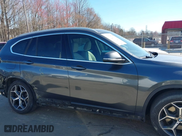 2018 BMW X1 xDrive28i z VIN WBXHT3C31J3H31737, wystawiony jako IAAI lot #41698670 z przebiegiem 68 017 mil mil oraz . Historia ofert i sprzedaży dostępna na DreamBid. Obrazek 14.