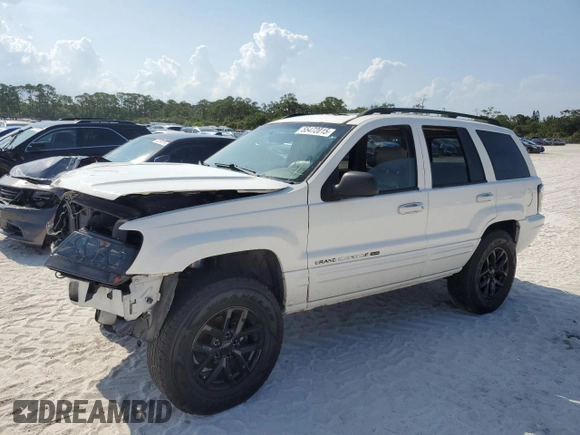 2002 Jeep Grand Cherokee Limited with VIN 1J4GX58S52C121941, listed as a Copart auction lot 55472015 with 182,225 mi miles and Salvage Title. Bid and sale history available at DreamBid. Image 1.