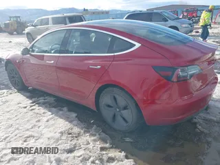 2018 Tesla Model 3 Long Range Battery with VIN 5YJ3E1EB0JF064041, listed as a IAAI auction lot 41562239 with 54,720 mi miles and . Bid and sale history available at DreamBid. Image 3.