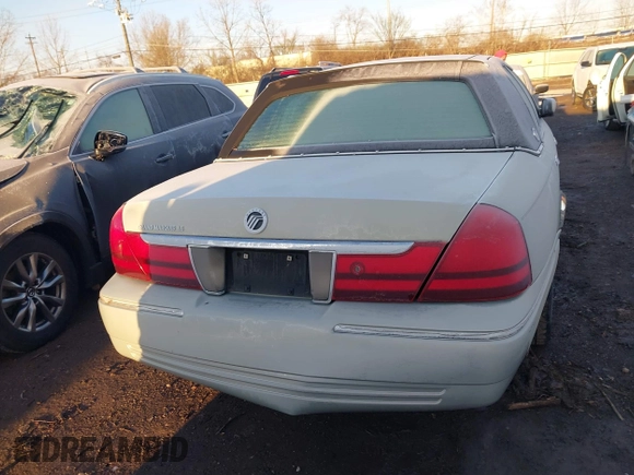 2003 Mercury Grand Marquis LS Premium with VIN 2MEHM75W53X704387, listed as a IAAI auction lot 41838775 with 312,869 mi miles and . Bid and sale history available at DreamBid. Image 16.