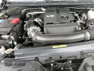 2023 Nissan Frontier SV z VIN 1N6ED1EJ2PN643431, wystawiony jako Copart lot #80293345 z przebiegiem 30 279 mil mil oraz Szkoda całkowita • Salvage title. Historia ofert i sprzedaży dostępna na DreamBid. Obrazek 13.