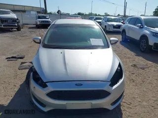 2016 Ford Focus SE with VIN 1FADP3F27GL320227, listed as a IAAI auction lot 41941368 with 128,527 mi miles. Bid and sale history available at carsss.com. Image 11.