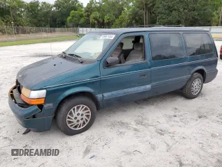1995 Dodge Caravan Grand SE z VIN 1B4GH44R8SX633988, wystawiony jako Copart lot #65667454 z przebiegiem 121 183 mil mil oraz Tytuł czysty. Historia ofert i sprzedaży dostępna na DreamBid. Obrazek 1.