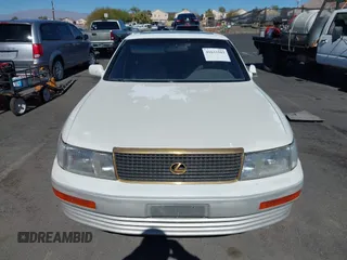 1991 Lexus LS z VIN JT8UF11E5M0073935, wystawiony jako IAAI lot #41633383 z przebiegiem 139 408 mil mil oraz . Historia ofert i sprzedaży dostępna na DreamBid. Obrazek 6.