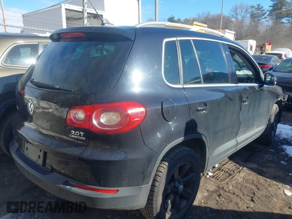 2011 Volkswagen Tiguan SE with VIN WVGBV7AXXBW511550, listed as a IAAI auction lot 41630804 with 99,967 mi miles and . Bid and sale history available at DreamBid. Image 4.