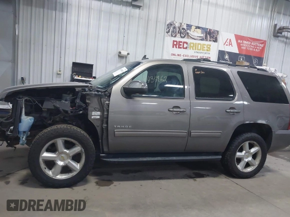 2011 Chevrolet Tahoe LT with VIN 1GNSKBE03BR268246, listed as a IAAI auction lot 41434862 with 250,991 mi miles and . Bid and sale history available at DreamBid. Image 15.