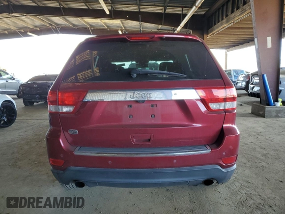 2013 Jeep Grand Cherokee Overland with VIN 1C4RJECT6DC526743, listed as a Copart auction lot 50203065 with 186,673 mi miles and Salvage Title. Bid and sale history available at DreamBid. Image 6.