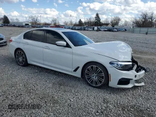 2019 BMW 5 Series 530i xDrive with VIN WBAJA7C50KG911549, listed as a Copart auction lot 50158135 with 91,390 mi miles and Salvage title. Bid and sale history available at DreamBid. Image 4.