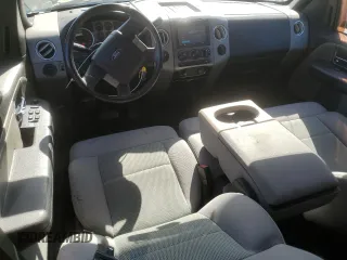 2006 Ford F-150 XLT with VIN 1FTPX14546FA87008, listed as a Copart auction lot 58005005 with 148,295 mi miles and Salvage title. Bid and sale history available at DreamBid. Image 8.