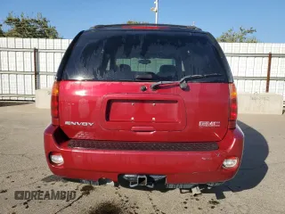 2006 GMC Envoy Denali with VIN 1GKES63M762237958, listed as a Copart auction lot 76999574 with 180,294 mi miles and Clean Title. Bid and sale history available at carsss.com. Image 6.
