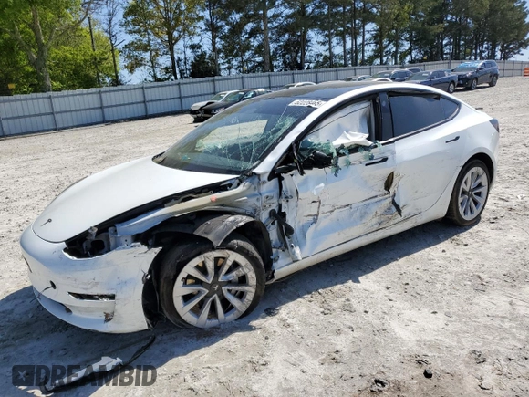 2023 Tesla Model 3 with VIN 5YJ3E1EA9PF558088, listed as a Copart auction lot 52228465 with 63,204 mi miles and Salvage title. Bid and sale history available at DreamBid. Image 1.
