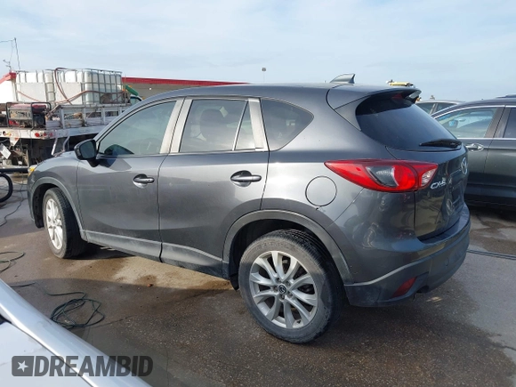 2014 Mazda CX-5 Grand Touring with VIN JM3KE2DY7E0345742, listed as a IAAI auction lot 41864116 with 158,746 mi miles. Bid and sale history available at carsss.com. Image 14.