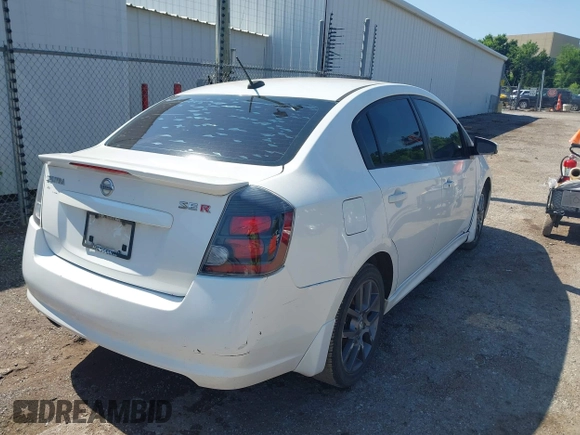 2012 Nissan Sentra SE-R z VIN 3N1BB6AP2CL670385, wystawiony jako IAAI lot #42431771 z przebiegiem 186 513 mil mil oraz . Historia ofert i sprzedaży dostępna na DreamBid. Obrazek 4.