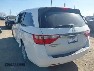2011 Honda Odyssey EX-L with VIN 5FNRL5H69BB062666, listed as a IAAI auction lot 41829319 with 152,105 mi miles and . Bid and sale history available at carsss.com. Image 3.