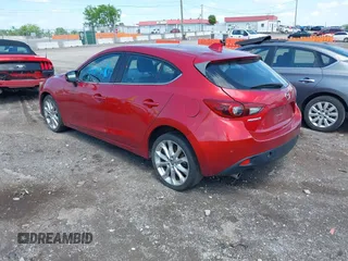 2014 Mazda 3 S Touring with VIN JM1BM1L36E1139818, listed as a IAAI auction lot 42129839 with 134,397 mi miles and . Bid and sale history available at DreamBid. Image 3.
